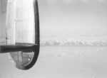 Icebergs frozen in strait