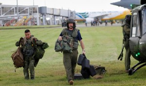 An air crew from 408 Squadron at CFB Edmonton, AB lands aboard a CH-146 Griffon helicopter at Iloilo Airport on Panay Island in the Philippines after conducting a flight through hardly typhoon-hit areas near Roxas, Friday afternoon, Nov. 29, 2013. - JEROME LESSARD/The Intelligencer/QMI Agency 